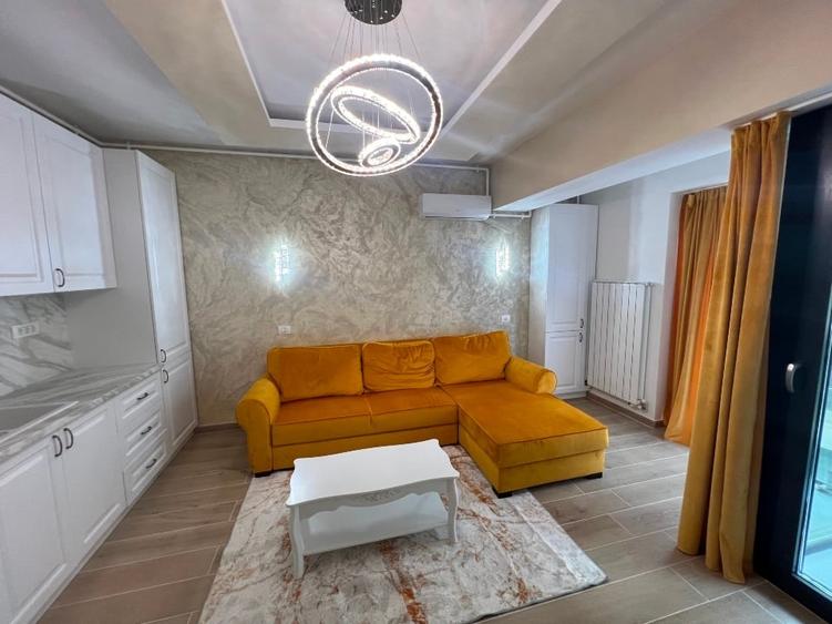 Apartament cu 2 camere semidecomandat, mobilat în Central
