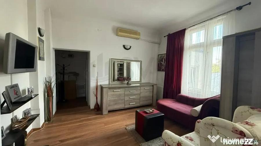 Apartament cu 4 camere semidecomandat în Cișmigiu