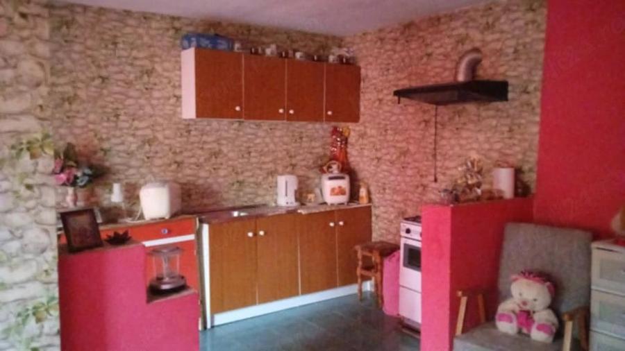 Casă cu 4 camere cu Teren 1000 Mp în Tătaru