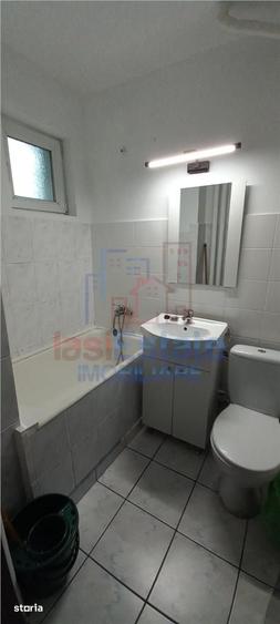 Apartament cu 2 camere semidecomandat în Podu Roș