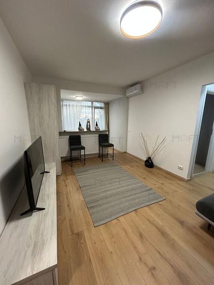 Apartament cu 2 camere semidecomandat, mobilat în Timpuri Noi