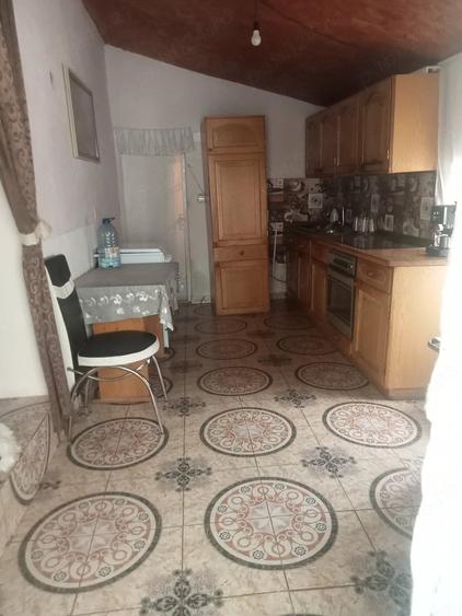 Casă cu Teren 1200 Mp în Central