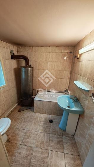 Casă individuală cu 4 camere cu Canalizare în Calea Moldovei