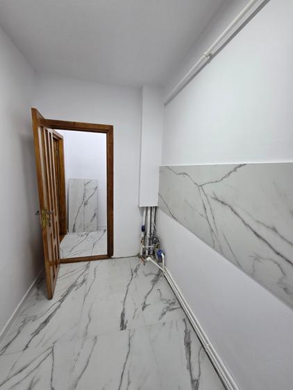 Apartament cu 2 camere semidecomandat în Adjud
