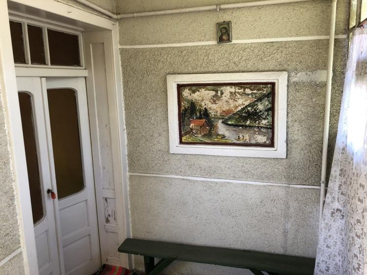 Casă individuală cu 2 camere cu Teren 1350 Mp în Râciu
