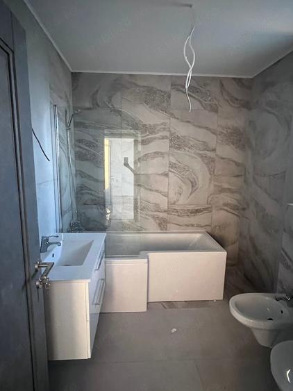 Apartament cu 3 camere decomandat în Tărlungeni