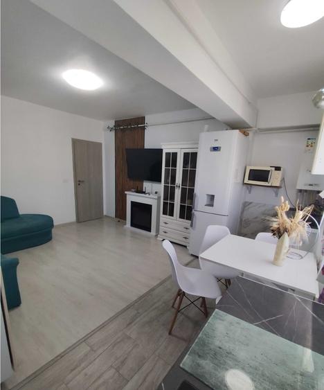 Apartament cu 2 camere semidecomandat în Cug