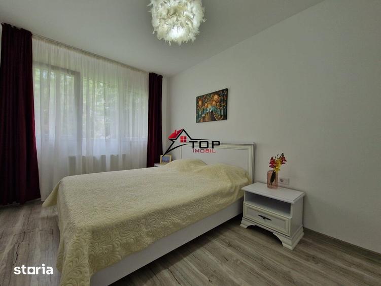 Apartament cu 2 camere semidecomandat, mobilat în Podu Roș