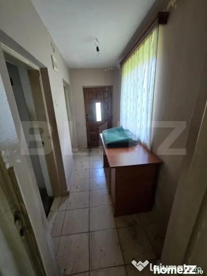 Casă cu 3 camere cu Teren 1500 Mp în Central