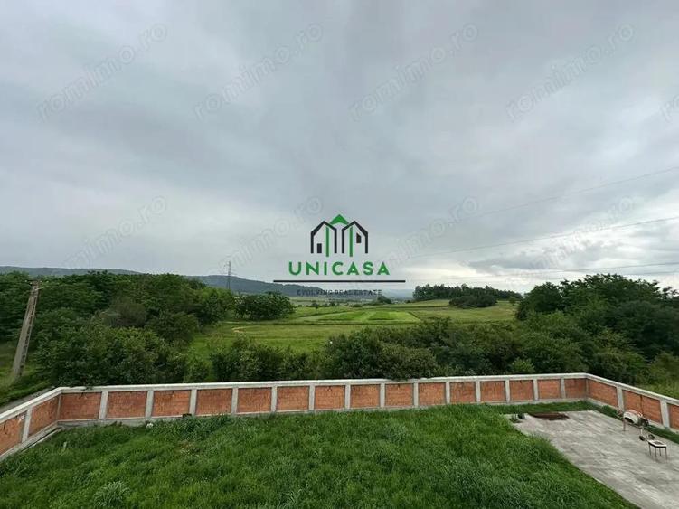 Casă cu Teren 2000 Mp în Români