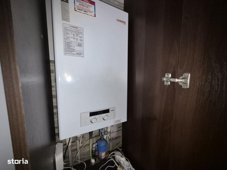 Apartament cu 4 camere decomandat în Bucium