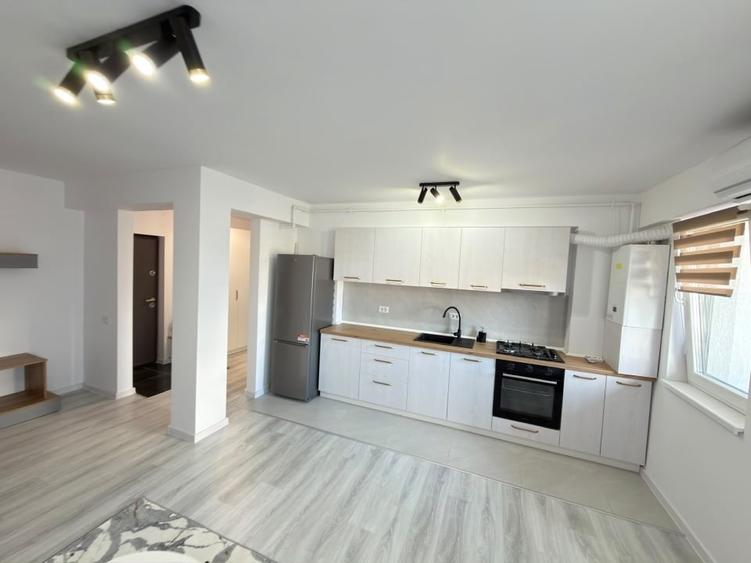 Apartament cu 2 camere semidecomandat, mobilat în Central
