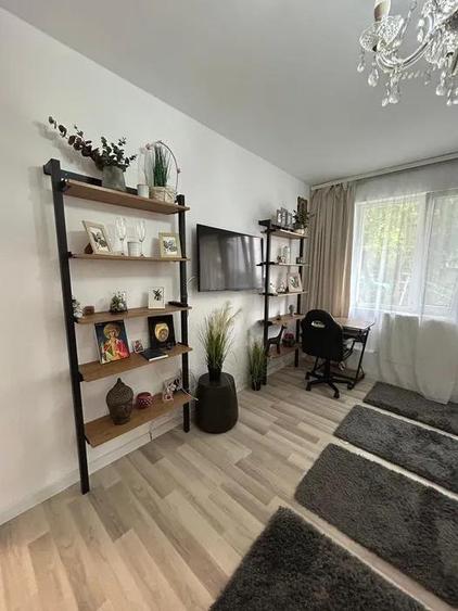 Apartament cu 2 camere semidecomandat, mobilat în Podu Roș
