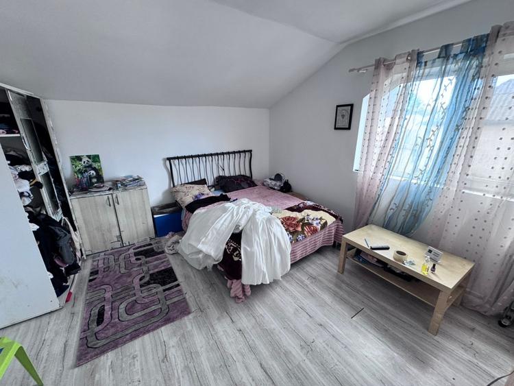 Casă individuală cu 4 camere cu Teren 120 Mp în Central