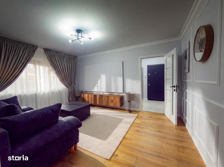 Apartament cu 3 camere semidecomandat, mobilat în Central