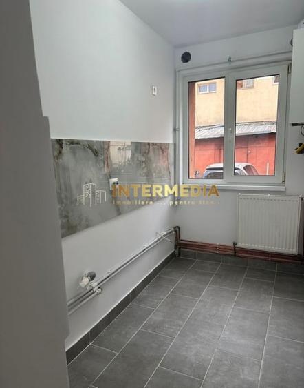 Apartament cu 2 camere semidecomandat, mobilat în Central
