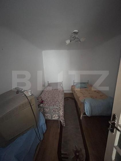 Casă individuală cu 4 camere cu Teren 400 Mp în Romanești