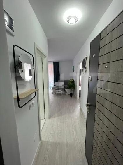 Apartament cu 2 camere semidecomandat, mobilat în Chinteni
