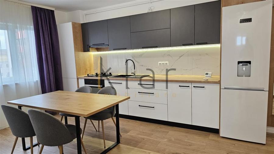 Apartament cu 3 camere semidecomandat, mobilat în Baciu