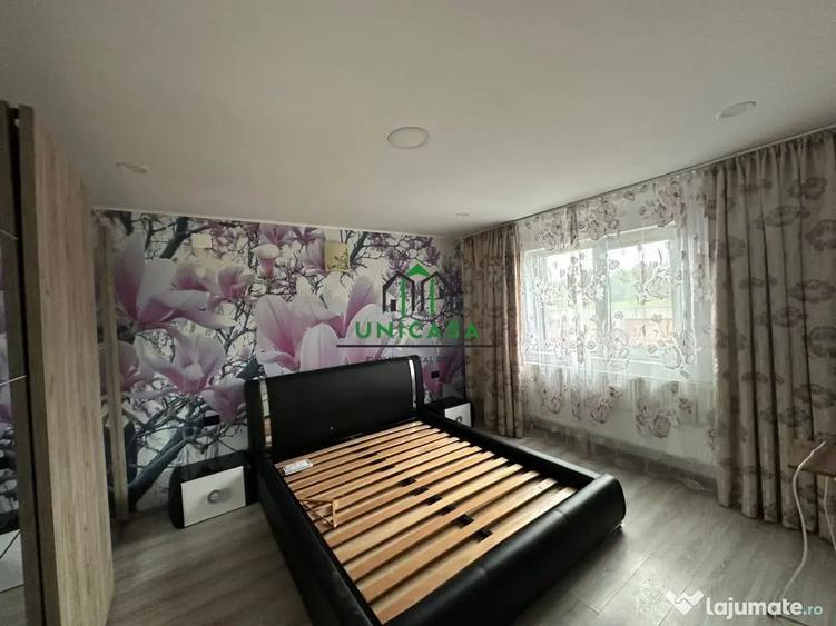 Casă cu 7 camere cu Teren 2000 Mp în Români
