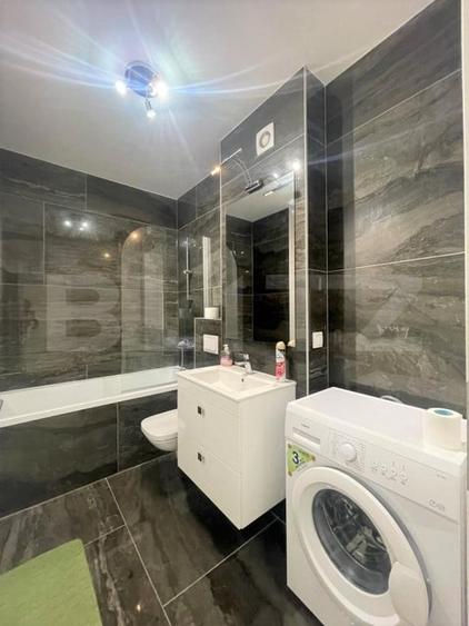 Apartament cu 2 camere semidecomandat, mobilat în Chinteni