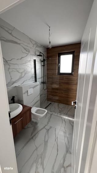 Casă cu 4 camere cu Teren 300 Mp în Tunari