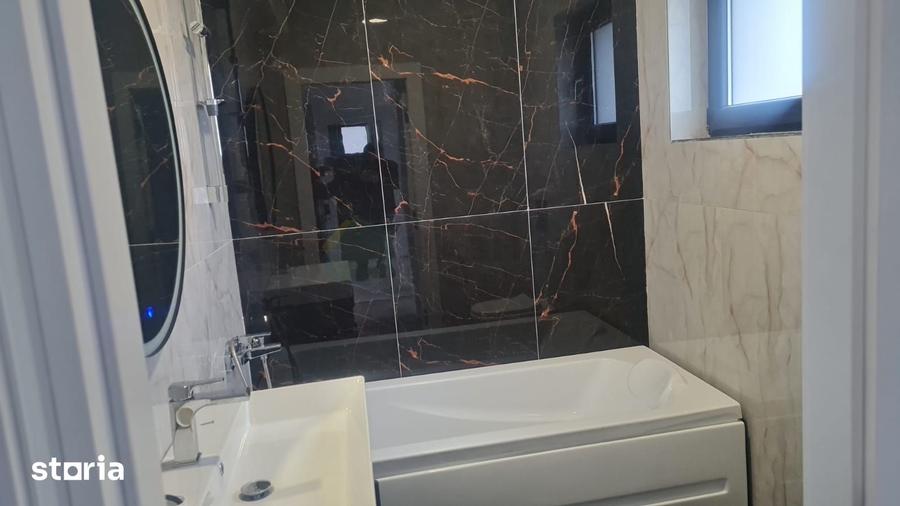 Casă cu 4 camere cu Teren 300 Mp în Tunari