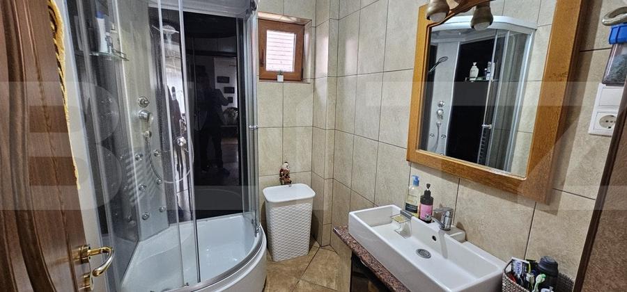Casă individuală cu 4 camere cu Garaj în Sântionlunca