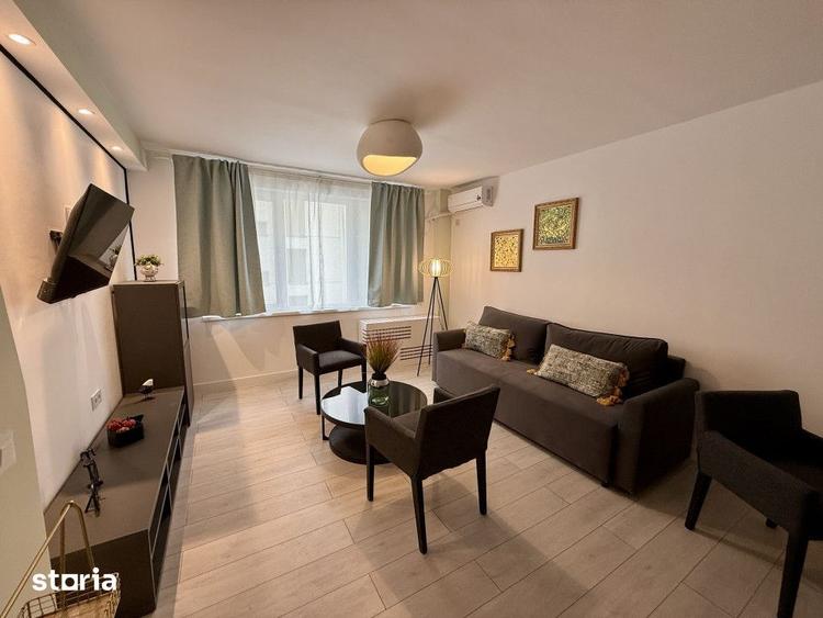 Apartament cu 2 camere semidecomandat, mobilat în Victoriei