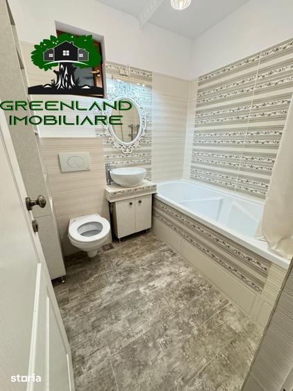 Apartament cu 7 camere decomandat în Bucium