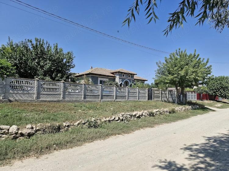 Casă cu Teren 1500 Mp în Tortoman