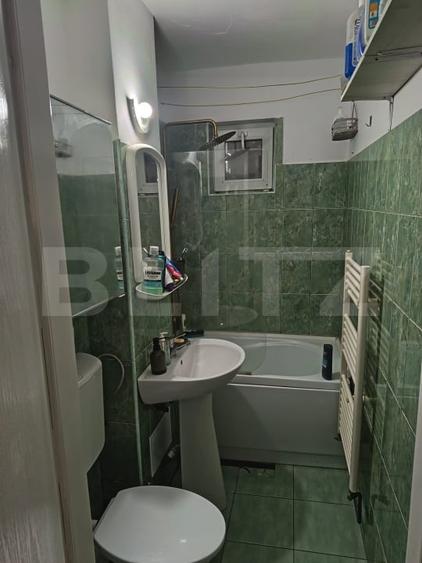 Apartament cu 2 camere semidecomandat, mobilat în Central