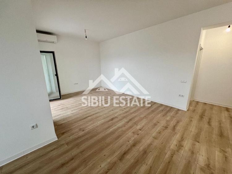 Apartament cu 3 camere decomandat în Șelimbăr — fotografia 1