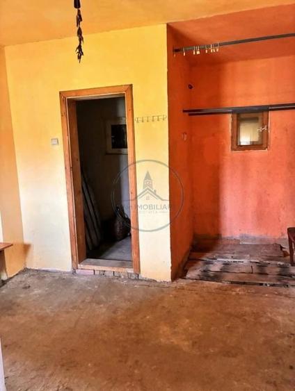Casă cu Teren 700 Mp în Central