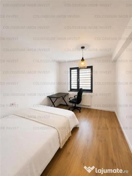 Apartament cu 3 camere decomandat în Tractorul