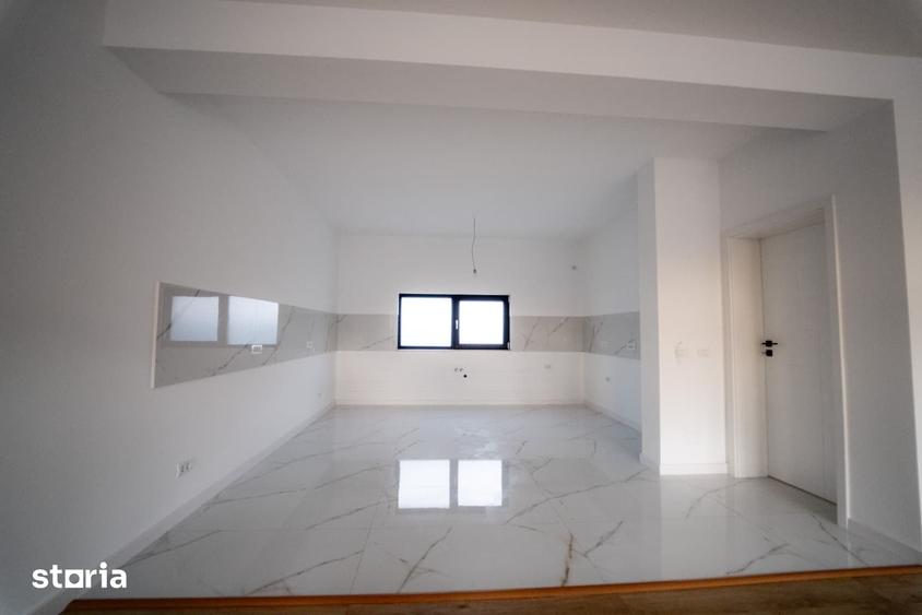 Casă cu 4 camere cu Teren 500 Mp în Bucov