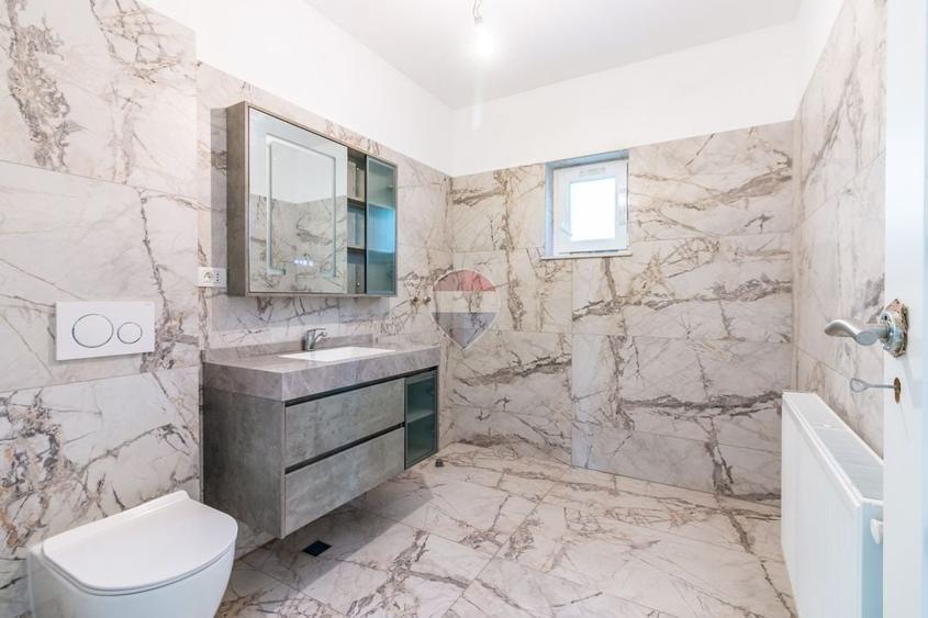 Casă individuală cu 4 camere cu Teren 1495 Mp în Bolintin-Deal
