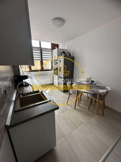 Apartament cu 2 camere semidecomandat, mobilat în Cug
