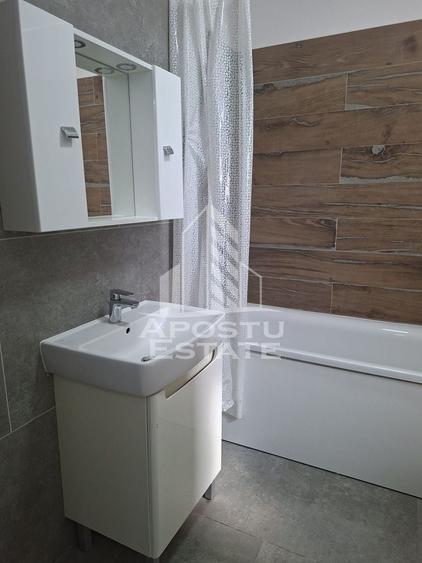 Apartament cu 2 camere semidecomandat, mobilat în Moșnița Nouă