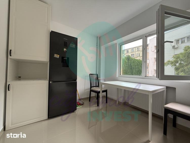 Apartament cu 4 camere decomandat în Romană