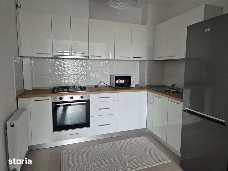 Bdul Bucuresti, nou, ap 2 camere cu centrala si AC, 450 euro, et 4/9 - 8