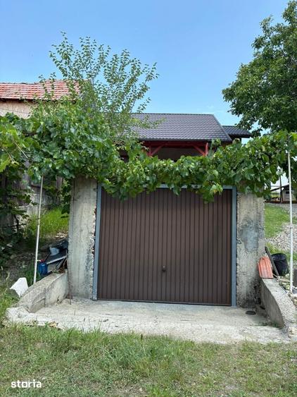 Casă cu 2 camere cu Teren 1100 Mp în Oituz
