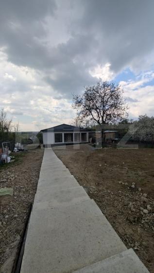 Casă individuală cu 3 camere cu Teren 900 Mp în Răzvad