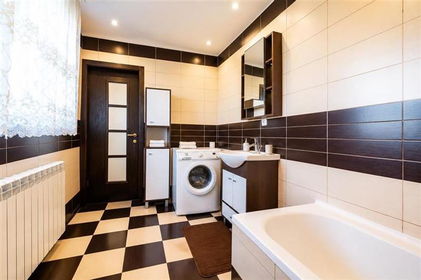 Casă individuală cu 5 camere cu Teren 450 Mp în Podu Oltului