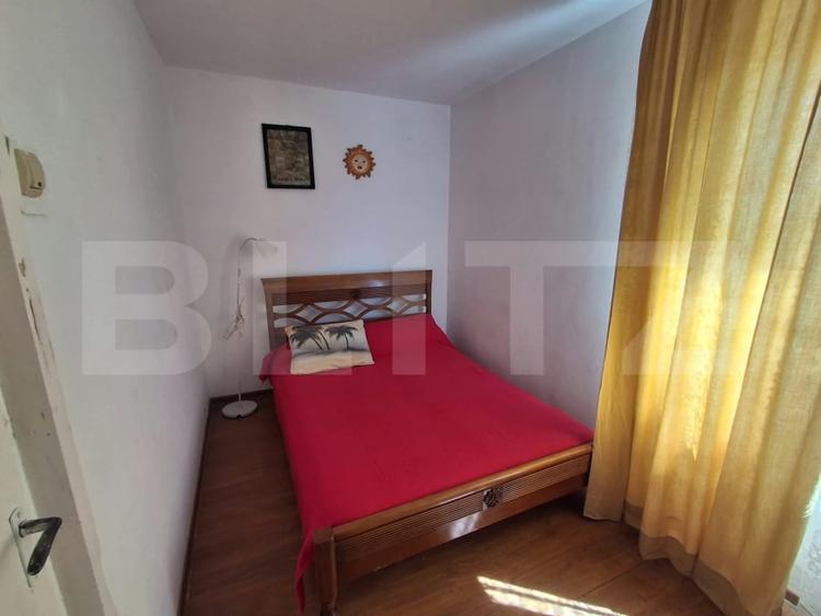 Apartament cu 2 camere semidecomandat, mobilat în Podul de Piatră