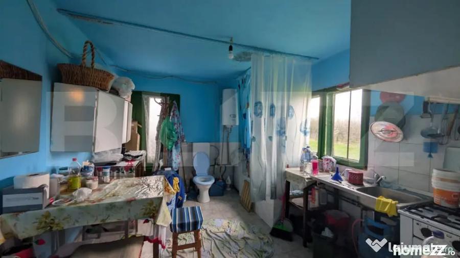 Casă cu 4 camere cu Teren 1100 Mp în Central