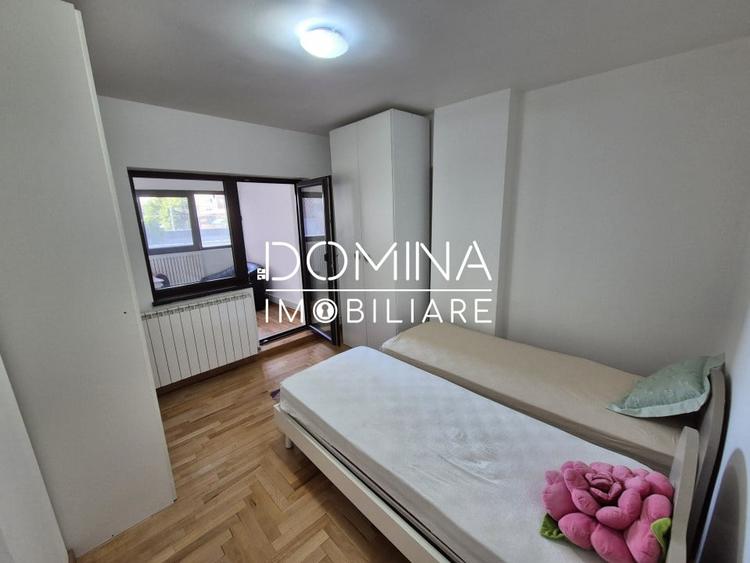 Apartament cu 3 camere semidecomandat, mobilat în Central