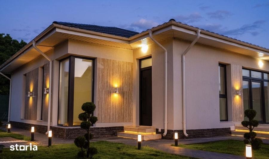 Casă cu 4 camere cu Teren 500 Mp în Bucov