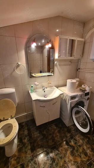 Casă cu 4 camere cu Teren 1730 Mp în Bucești