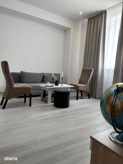 Apartament cu 3 camere semidecomandat în Văcăresti